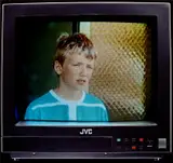 Jeff Wall, Boy on TV, from Eviction Struggle (V. 28b, P. 22), 1989, Cibachrome print in colors, the full sheet