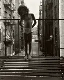 East 100th Street, New York (girl on fire escape) by Bruce Davidson, 1966, Gelatin silver print, printed later, offered Apr 2023
