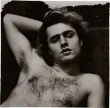 Young man on a sofa, N.Y.C. by Diane Arbus, 1966, Gelatin silver print, printed between 1966 and 1967, sold Apr 2023