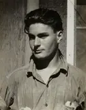 Dorothea Lange, Portrait of a Young Man in Open Denim Shirt