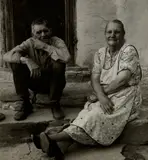 Dorothea Lange, Couple Seated on Porch, Gunlock, Utah, from Three Mormon Towns