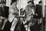 Dorothea Lange, Two Men and a Woman on a Street Car