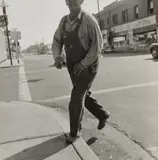 Dorothea Lange, Man Stepping on Curb, from Ballet