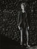 Boy against a Peat Wall, Ireland by Dorothea Lange, 1954, Gelatin silver print, sold Mar 2023