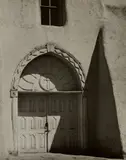 Entrance to Church at Rancho de Taos by Alma Lavenson, 1941, Gelatin silver print, offered Oct 2023