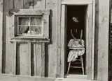 Wife and Baby of President of Ola Self-Help Sawmill Co-op in Doorway of their Home, Gem County, Idaho by Dorothea Lange, 1939, Gelatin silver print, offered Oct 2023