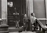 Helen Levitt, N.Y. (masked children on stoop)