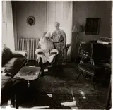 Mr. & Mrs. Santa Claus in their living room, Albion, N.Y. by Diane Arbus, 1964, Gelatin silver print, printed later by Neil Selkirk, offered Oct 2023