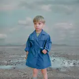 Loretta Lux, Boy in a Blue Raincoat 2