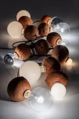 Kelley Walker and Wade Guyton, Coconut Lights, 2005, coconut shells, light bulbs and electrical wiring