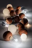Kelley Walker and Wade Guyton, Coconut Lights, 2005, coconut shells, light bulbs and electrical wiring