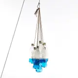 Tony Feher, Untitled, 1997–1998, plastic bottles, water, food dye and rope, in 10 parts