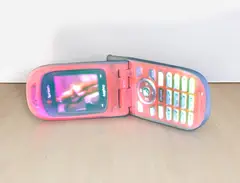 Tony Oursler, Cherry Nokia, 2008, DVD, DVD player and video projector on resin