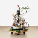 Sarah Sze, Lower Treasury, 2000, mixed media, found objects, DVD player, media player and video projector
