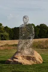 Jaume Plensa, Kneeled Shadow, 2008, welded pressed steel and boulder