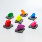 Seven Small Mountains by Ugo Rondinone, 2016, painted stone on concrete base, in 14 parts, sold Nov 2022