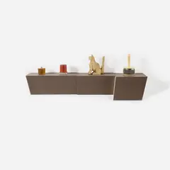 shine of silver by Haim Steinbach, 2016, plastic laminated wood shelf, two wooden foundry molds, hand carved wooden cat statue and wood and metal cabasa, sold Nov 2022