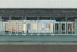 Richard Estes, Ten Doors, from Urban Landscapes (A. p. 112)