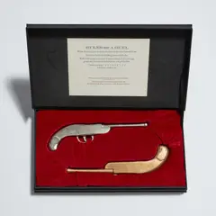 Drunken Duel by Vik Muniz, 1991, Two bronze multiples, one polished in silver, contained in the original velvet and foam-lined black cloth-covered box, sold Apr 2022