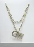 Thomas Hirschhorn, Necklace CNN, 2002, Multiple comprised of cardboard, foil, plastic, gold wrapping paper and tape