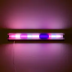 Spencer Finch, Moonlight (Luna County, New Mexico, July 13, 2003), 2003, Fluorescent light fixture, nine colored filters adhered to a fluorescent tube light (as issued), with an accompanying extra set of filters