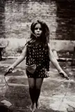 Barefoot child jumping rope, N.Y.C. by Diane Arbus, 1963, Gelatin silver print, printed 1963-1964, sold Apr 2022