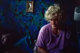 Sharon with Cookie on the Bed, Provincetown, MA by Nan Goldin, 1989, Dye destruction print, sold Apr 2022