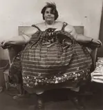 Miss Mary King and her dog, Troubles, Carnival, Maryland by Diane Arbus, 1964, Gelatin silver print, offered Oct 2022