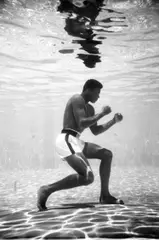 Ali Underwater by Flip Schulke, 1961, Gelatin silver print, printed later, mounted, sold Oct 2022