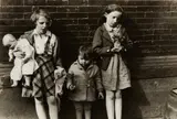 Helen Levitt, N.Y. (children with doll and flowers)