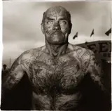 Diane Arbus, Tattooed Man at a Carnival, MD.