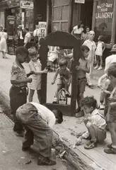 N.Y.C. (children with broken mirror) by Helen Levitt, 1940, Gelatin silver print, printed later, sold Mar 2022