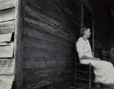 Green County, Georgia (woman on porch) by Dorothea Lange, 1937, Gelatin silver print, printed later, sold Oct 2022