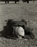 San Francisco (man lying on grass) by Dorothea Lange, 1934, Gelatin silver print, probably printed 1950s, offered Oct 2022