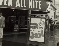 Drunk Drivers Go To Jail by Dorothea Lange, circa 1955, Gelatin silver print, offered Oct 2022