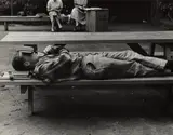 Man Sleeping on Bench by Dorothea Lange, 1957, Gelatin silver print, offered Oct 2022