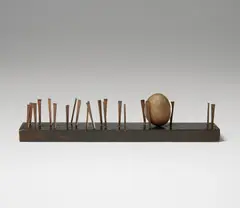 Robert Rauschenberg, Untitled (Elemental Sculpture), 1953, painted wood with masonry nails and stone