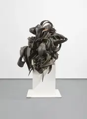 Chakaia Booker, Yearnings Unchecked, 2003, cut rubber tires, steel, screws and wood