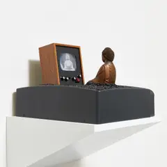 Enlightenment Compressed by Nam June Paik, 1994, color LCD TV, video camera, wood TV cabinet, plastic TV case, bronze Buddha, aquarium stones and paint, sold Nov 2021