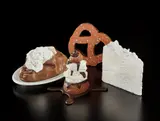 Claes Oldenburg, Wedding Souvenir; Baked Potato; Profiterole; and N.Y.C. Pretzel (P. 5; P. 3; G. 1457, P. 22; A. & P. 250.1), 1966-1994, Four multiples, one in cast plaster with hand-painting, one in cast resin with hand-painting with original Shenango china dish, one in cast aluminum with hand-painting and one screenprint in colors on three-ply cardboard
