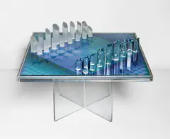 Vasarely Chess Set by Victor Vasarely, 1982, The complete chess set with screenprint in colors on acrylic contained in an acrylic frame with glass table top, accompa, sold Apr 2021