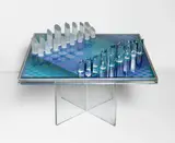 Victor Vasarely, Vasarely Chess Set, 1982, The complete chess set with screenprint in colors on acrylic contained in an acrylic frame with glass table top, accompanying acrylic base and 32 cast resin chess pieces