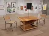 Franz West, Creativity: Furniture Reversal, 1998, 2 chairs, table, lamp, various coloured fabric tapes, DVD, and videocassette
