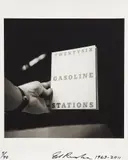 Ed Ruscha, Light Years: Conceptual Art and the Photograph (Hand Showing Book Cover), 2011, Gelatin silver print, with accompanying book Light Years: Conceptual Art and the Photograph, 1964-1977 , all contained in the original black cloth-covered portfolio, printed later