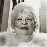 Woman with a veil on Fifth Avenue, N.Y.C. by Diane Arbus, 1968, Gelatin silver print, printed later by Neil Selkirk, sold Apr 2021