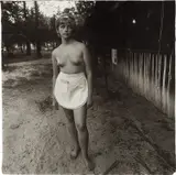 A young waitress at a nudist camp, N.J. by Diane Arbus, 1963, Gelatin silver print, printed later by Neil Selkirk, sold Apr 2021