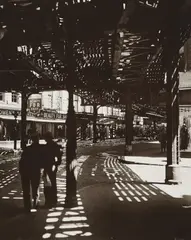 'El,' Second and Third Avenue Lines: Bowery and Division Street, Manhattan by Berenice Abbott, 1936, Gelatin silver print, sold Apr 2021