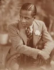 Portrait of a Young Man with Boutonniere, Harlem by James VanDerZee, 1934, Gelatin silver print, sold Apr 2021