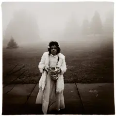 A Flower Girl at a Wedding, Conn. by Diane Arbus, 1964, Gelatin silver print, printed later by Neil Selkirk, sold Oct 2021