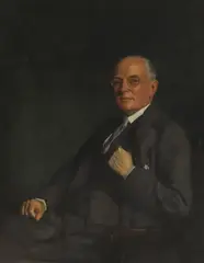 Oswald Birley, Portrait of James Thursby Pelham, half-length seated, in a grey suit and waistcoat, oil on canvas